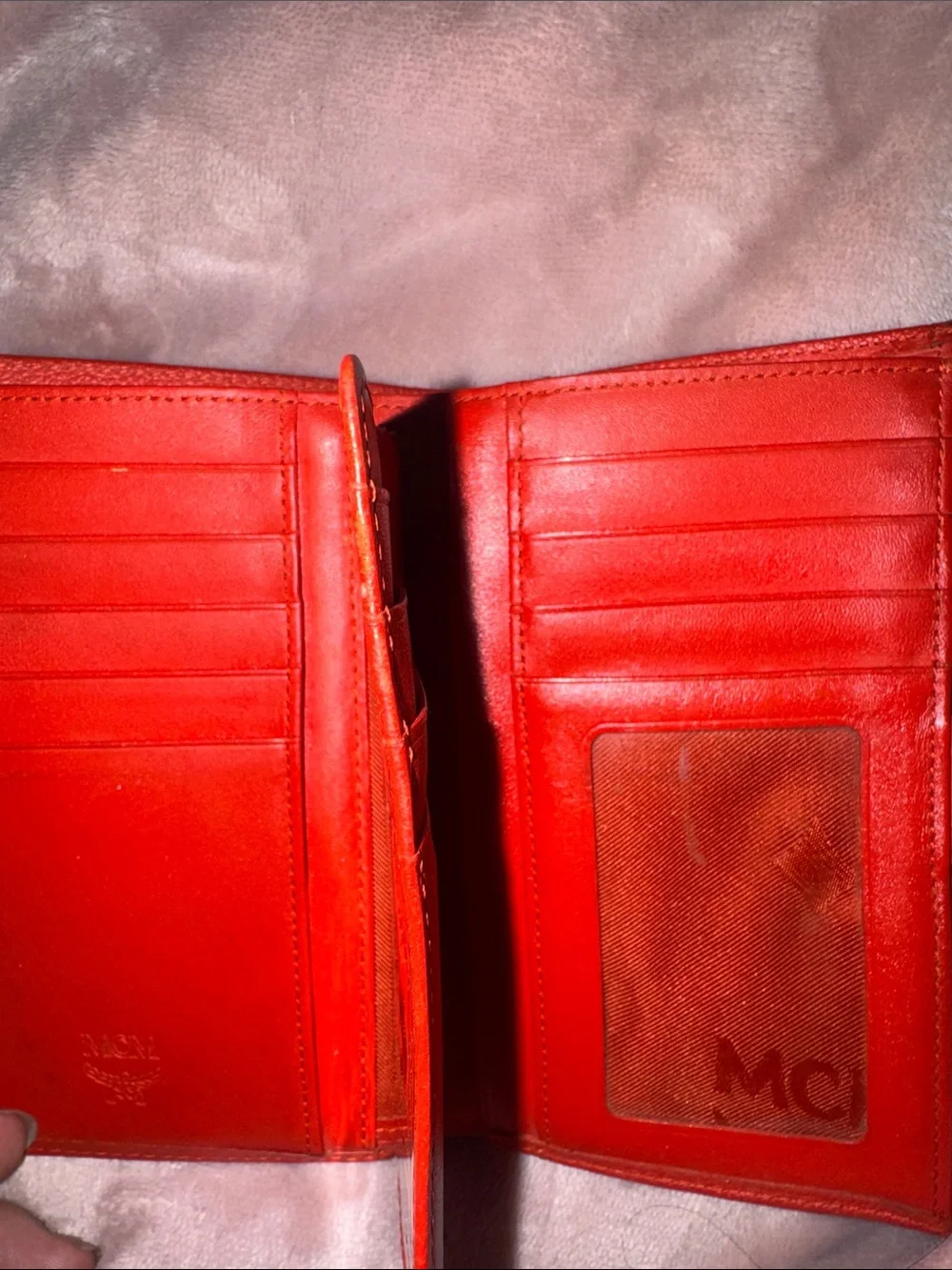 MCM Red Pebbled Leather Fold-Over Wallet.